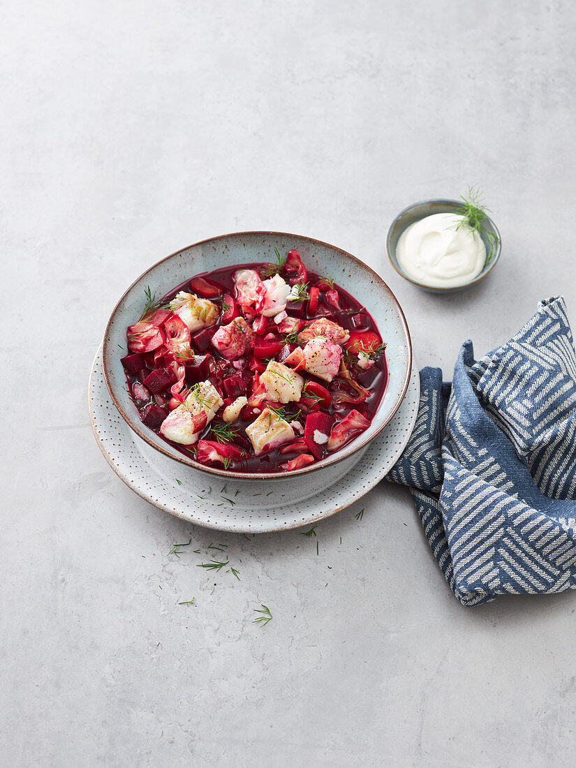 Russian cod borscht with pointed cabbage and carrots