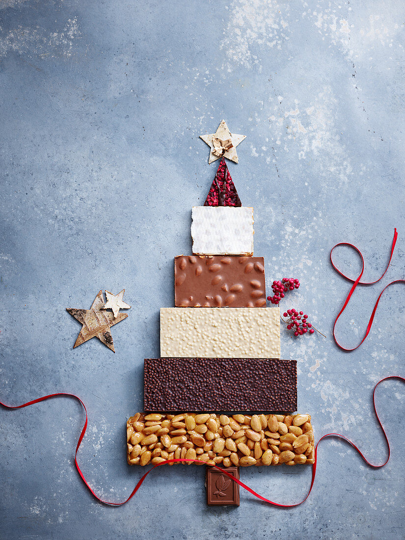 Christmas tree built of different chocolate bars