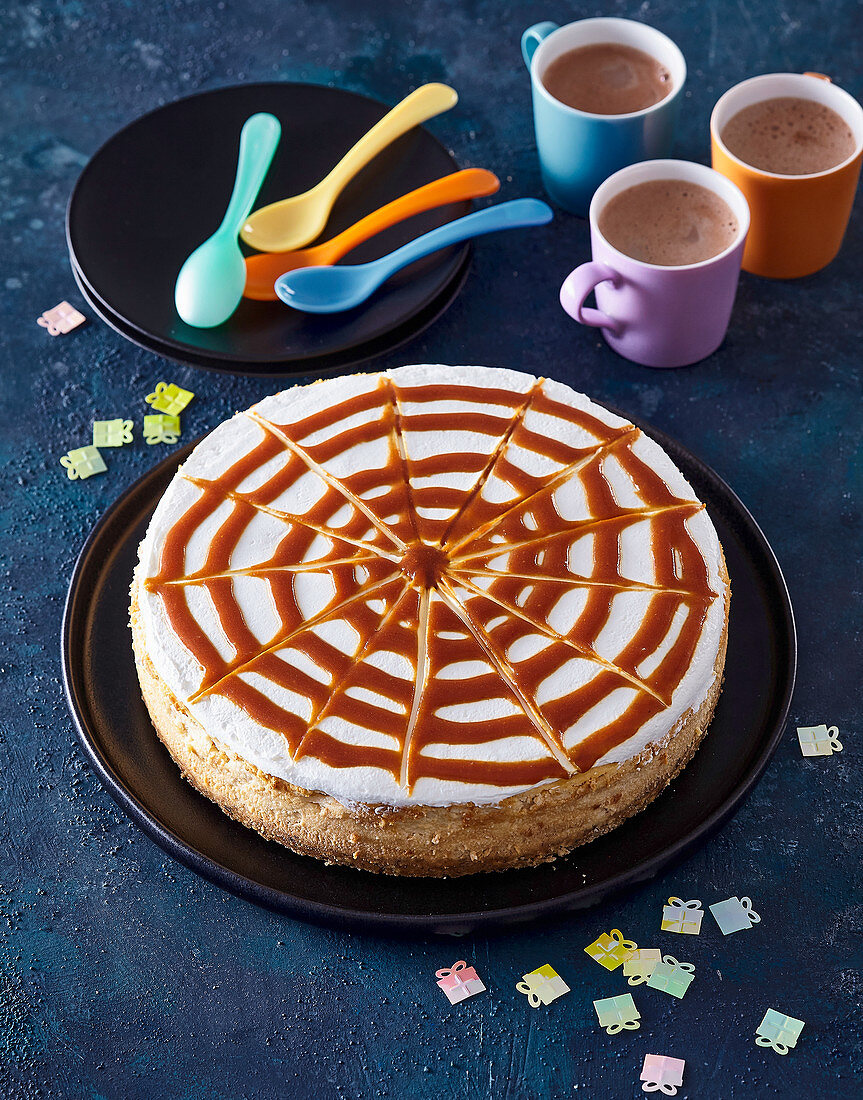 Cheesecake decorated with a caramel 'Spider Web'