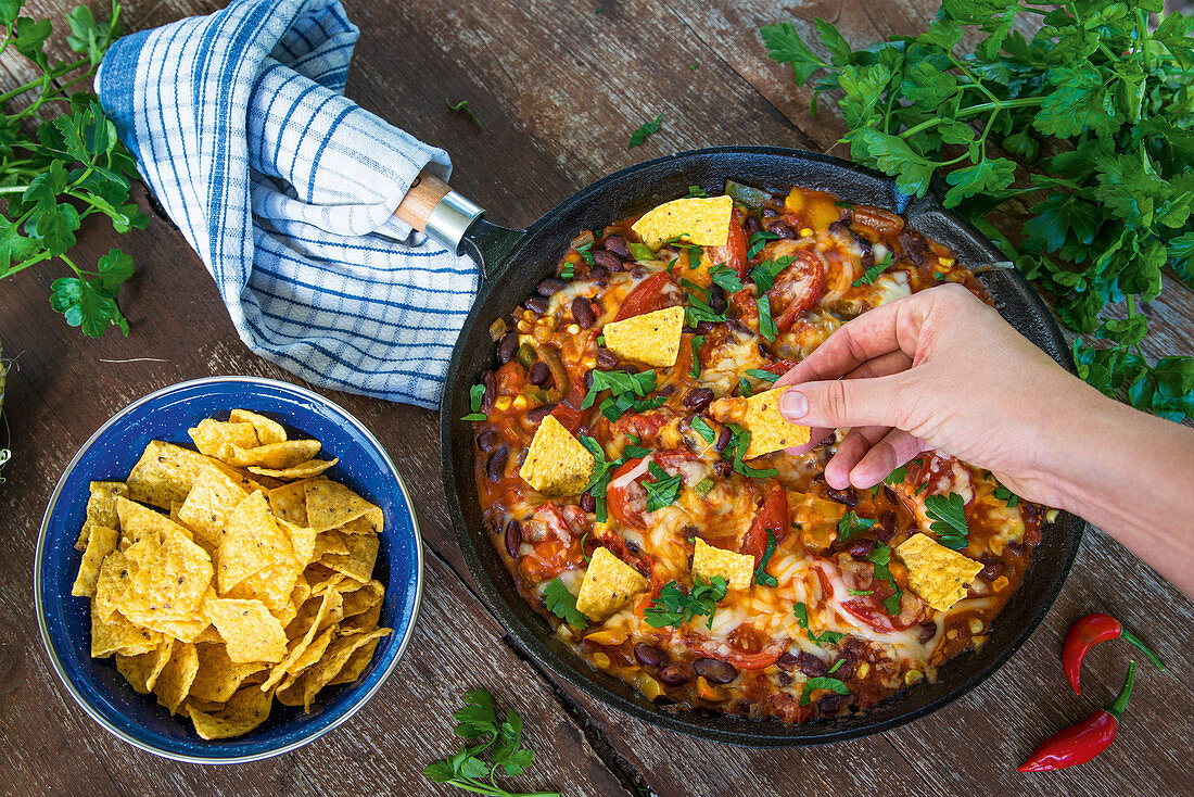 Pan-o-nachos with tomatoes and beans