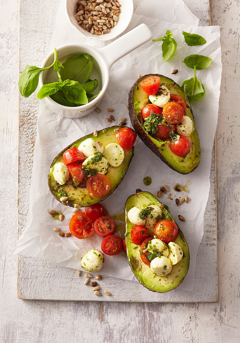 Stuffed avocados caprese