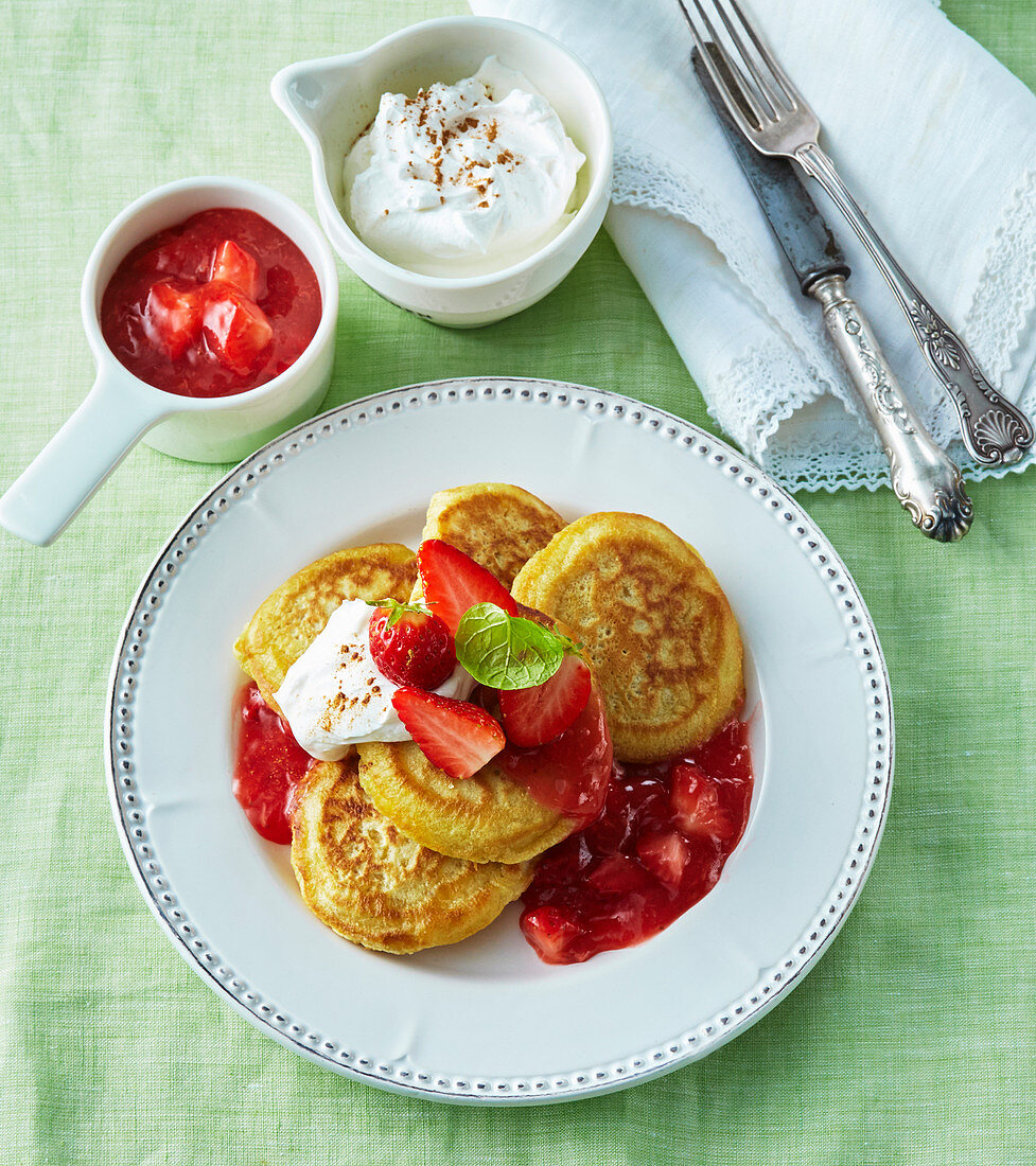 Coconut pancakes with strawberry sauce