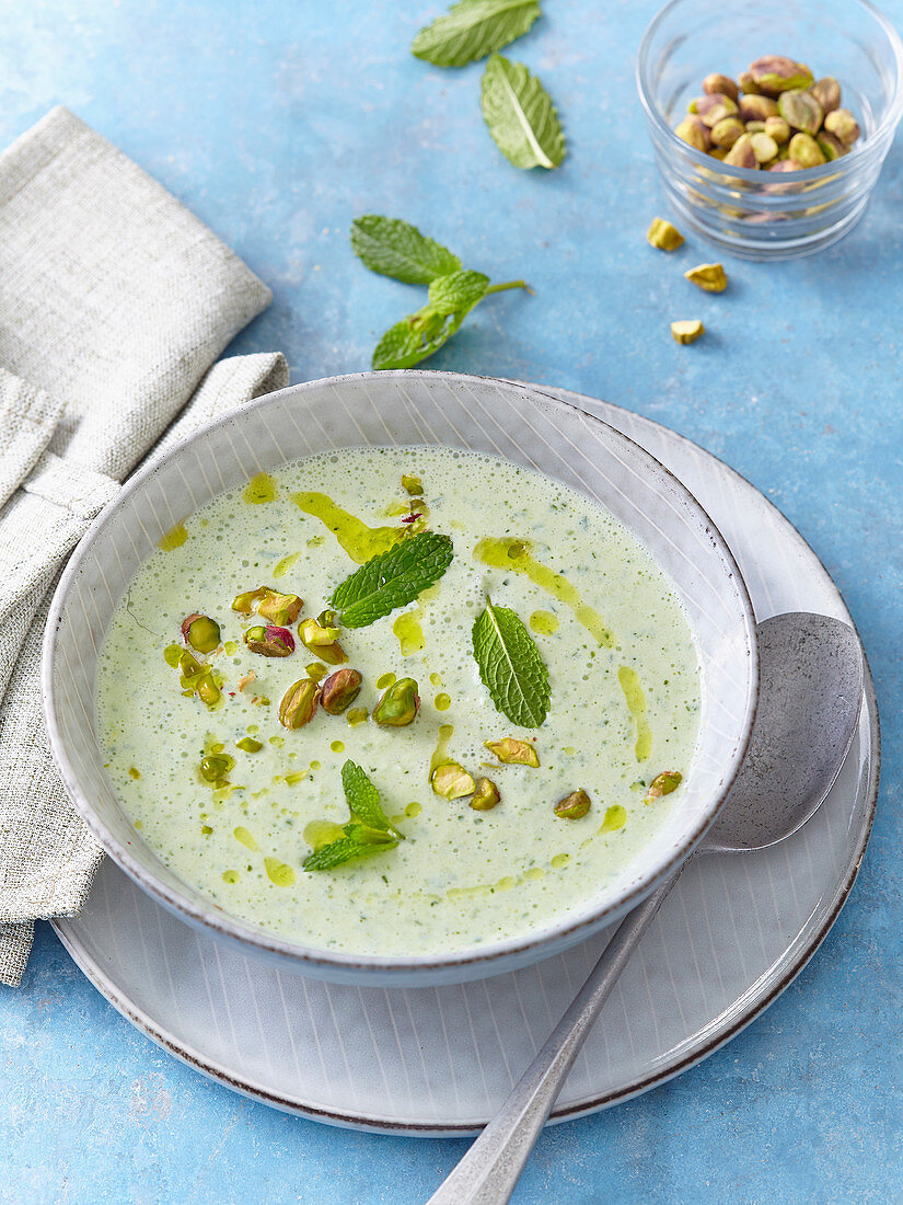 Cold cucumber soup with mint and pistachios