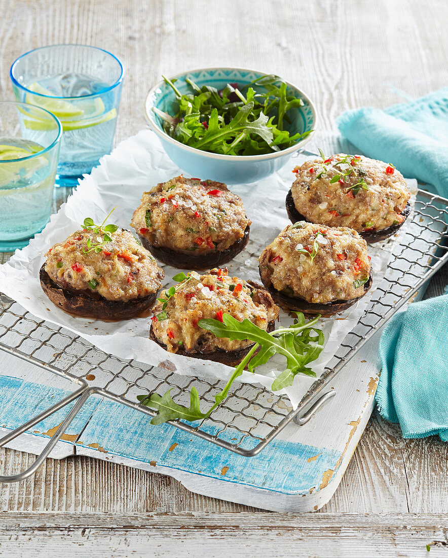 Gratinated portobello mushrooms with cheese and mincemeat stuffing