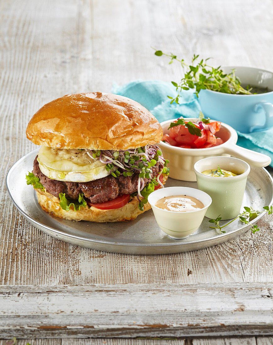 Grilled hamburger with goat cheese