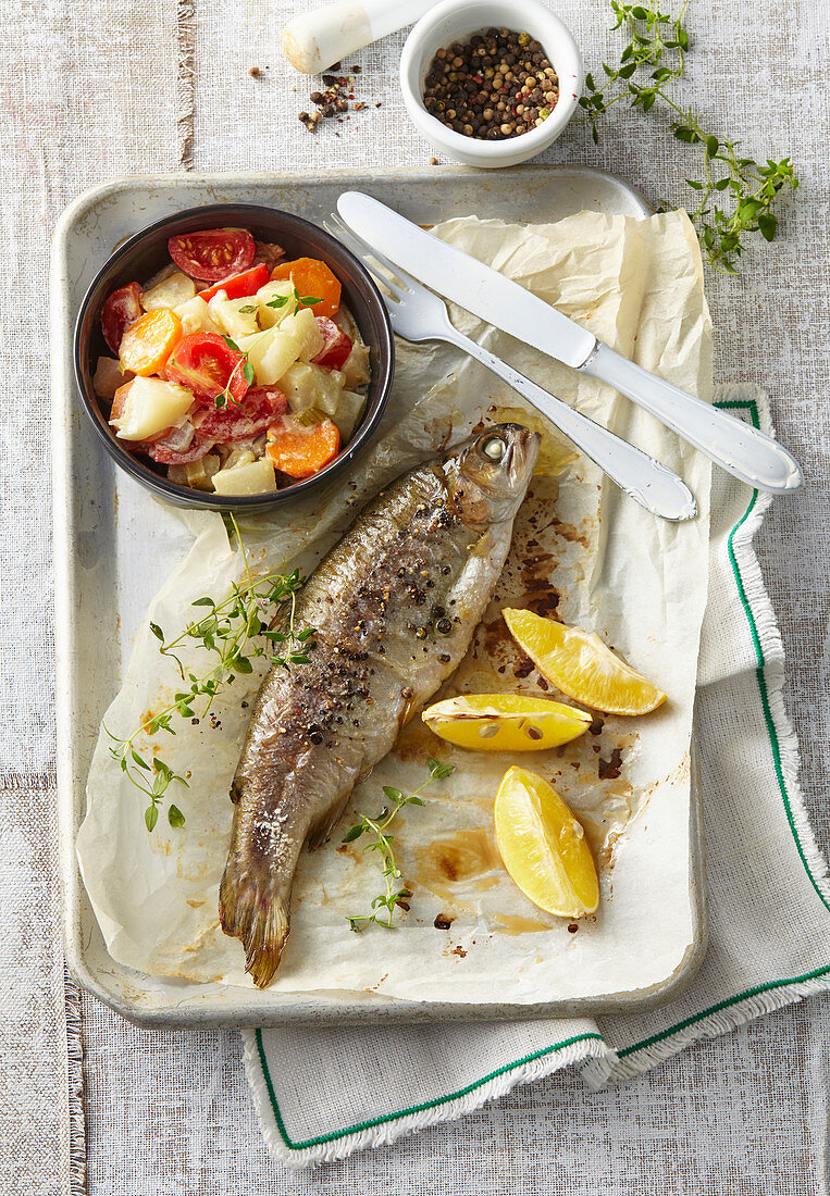 Roasted trout with black salfity ragout