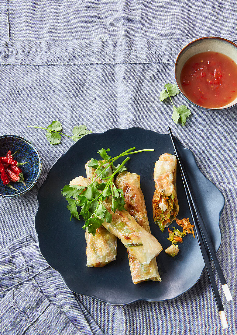 Rolls from rice paper with homemade chili sauce