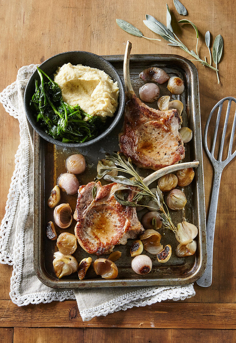 Baked pork cutlets with shalots, spinach and celery puree