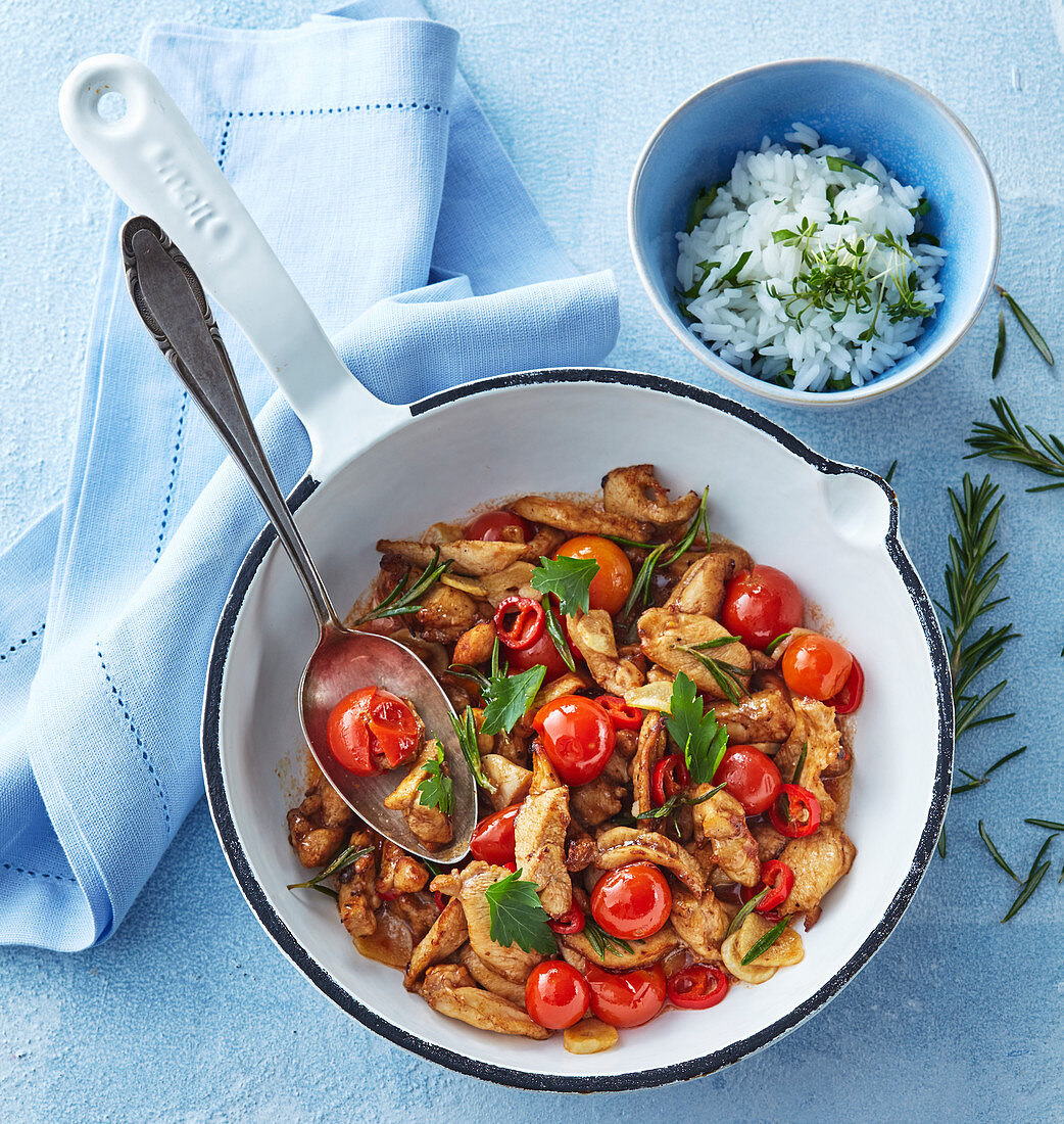 Kaninchenragout mitTomaten und Rosmarin dazu Reis