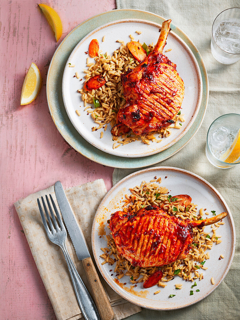 Harissa pork chops with carrot, cumin and rice salad