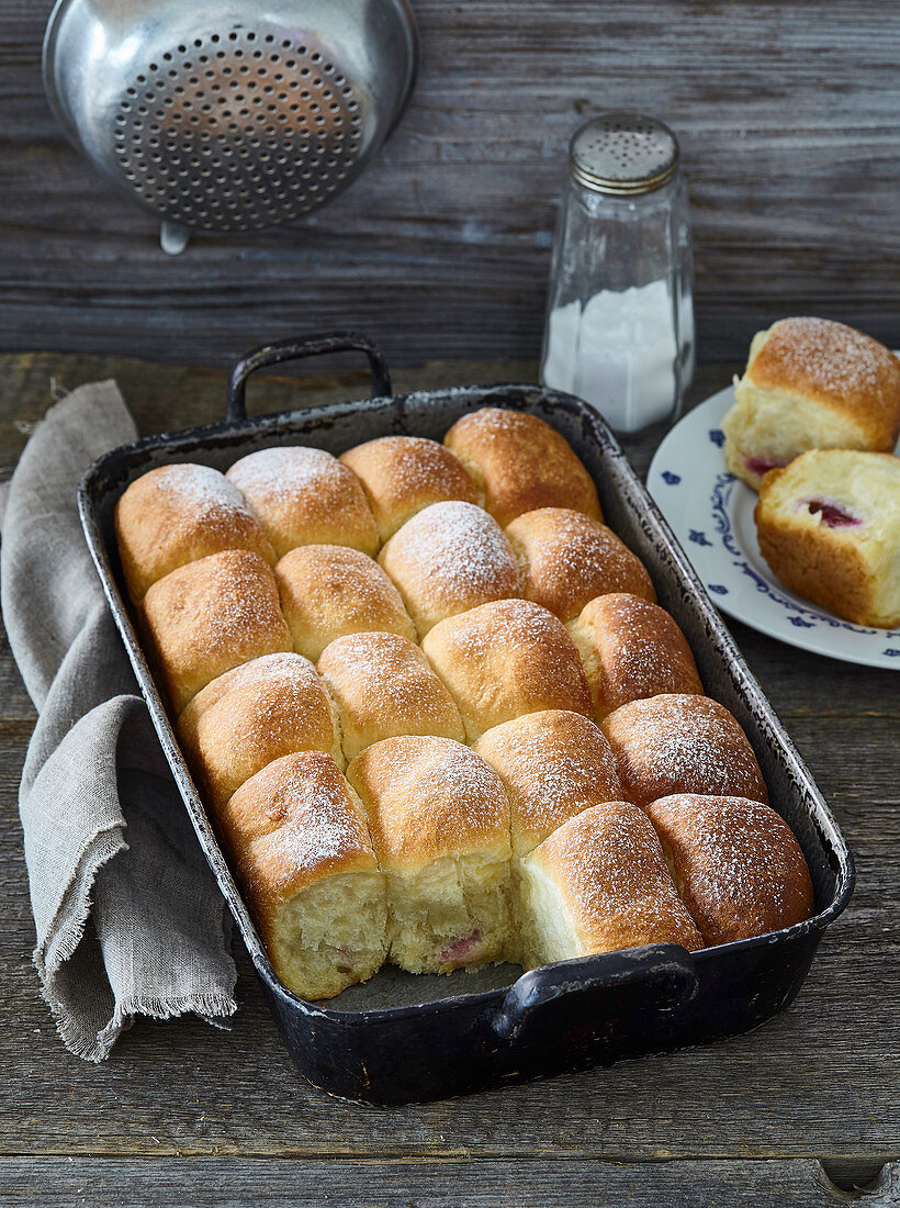 Plum sweet buns with marchpane