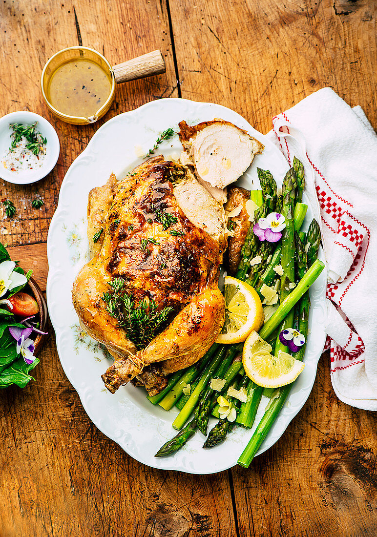 Roast chicken with green asparagus