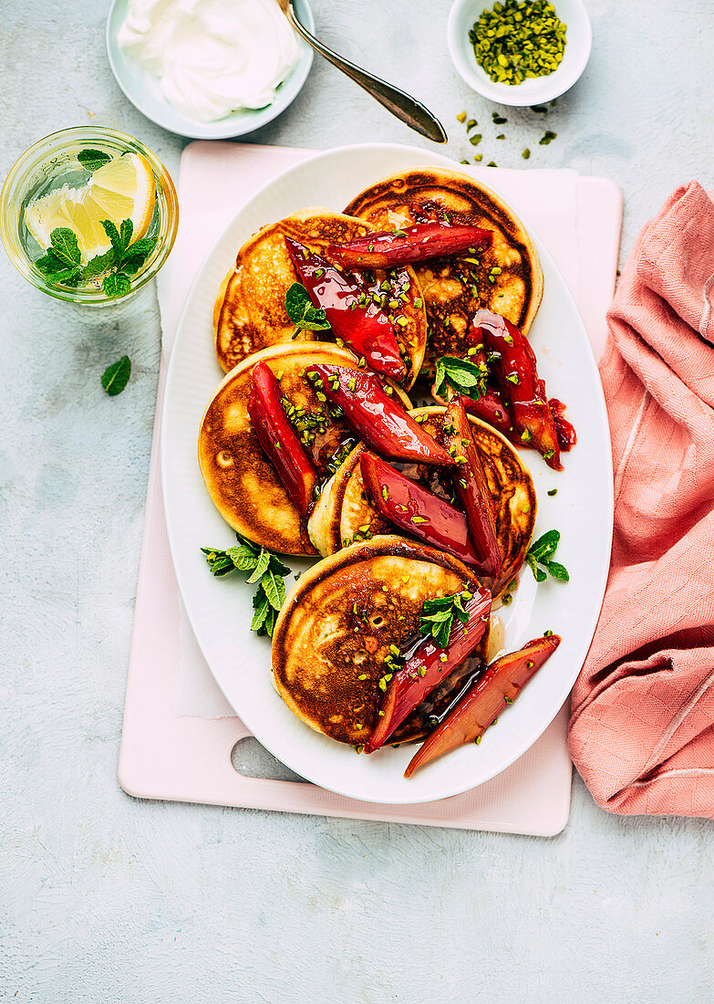 Yogurt pancakes with rhubarb compote and honey