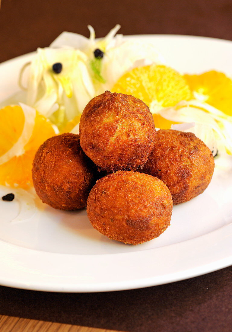 Cod balls with fennel and orange salad