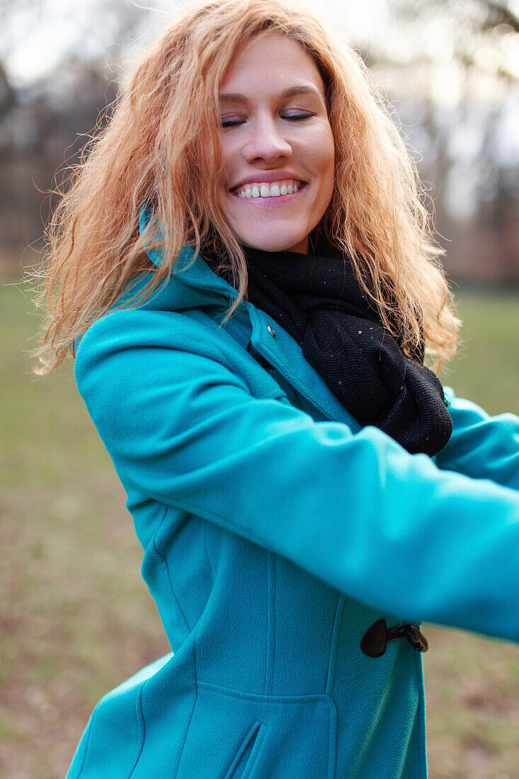 Happy woman in park