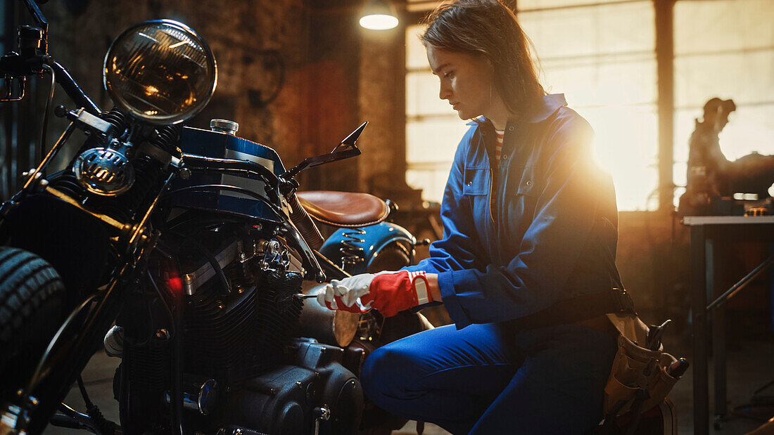 Mechanic fixing a motorcycle