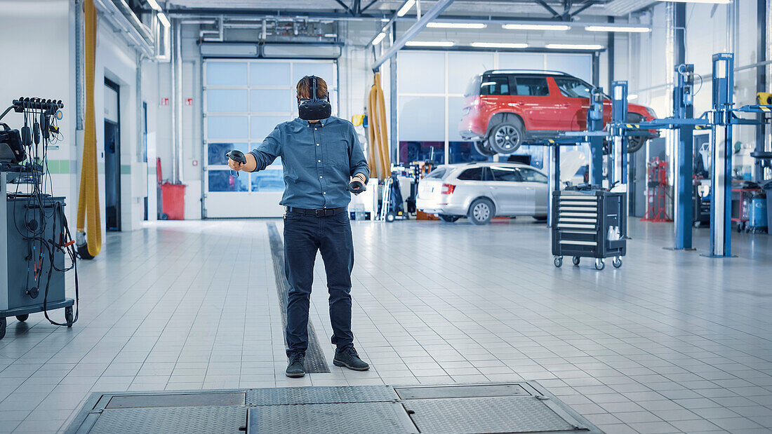 Technician wearing virtual reality headset