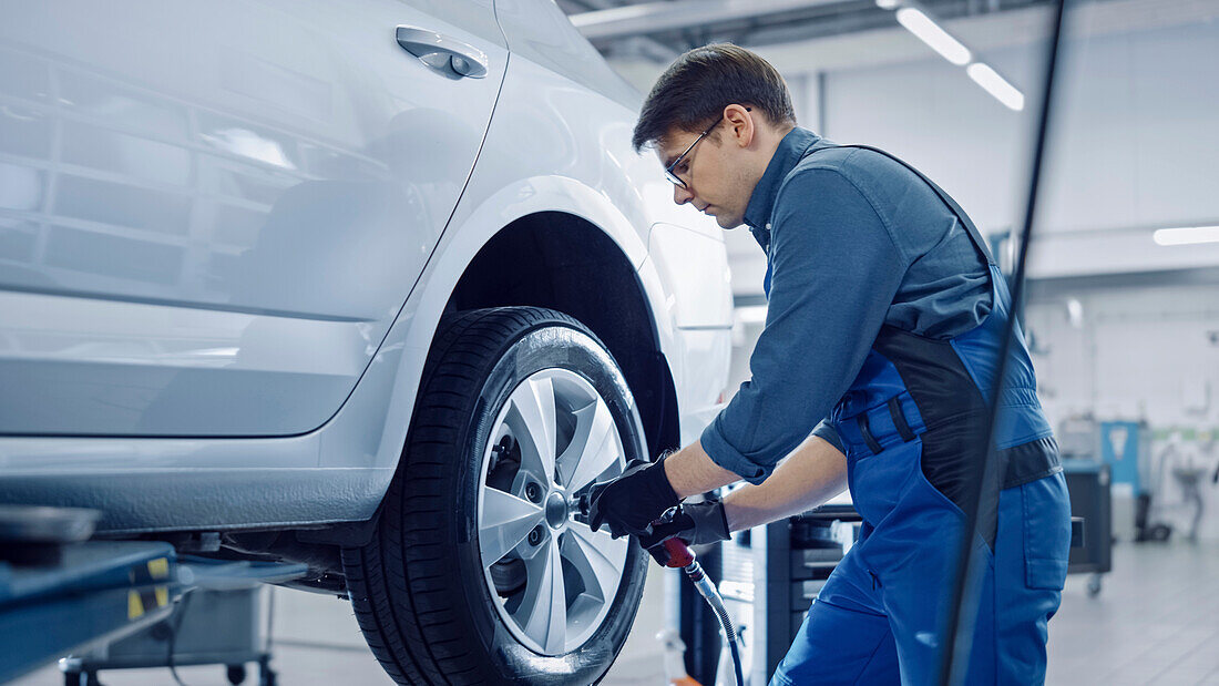 Mechanic working on car