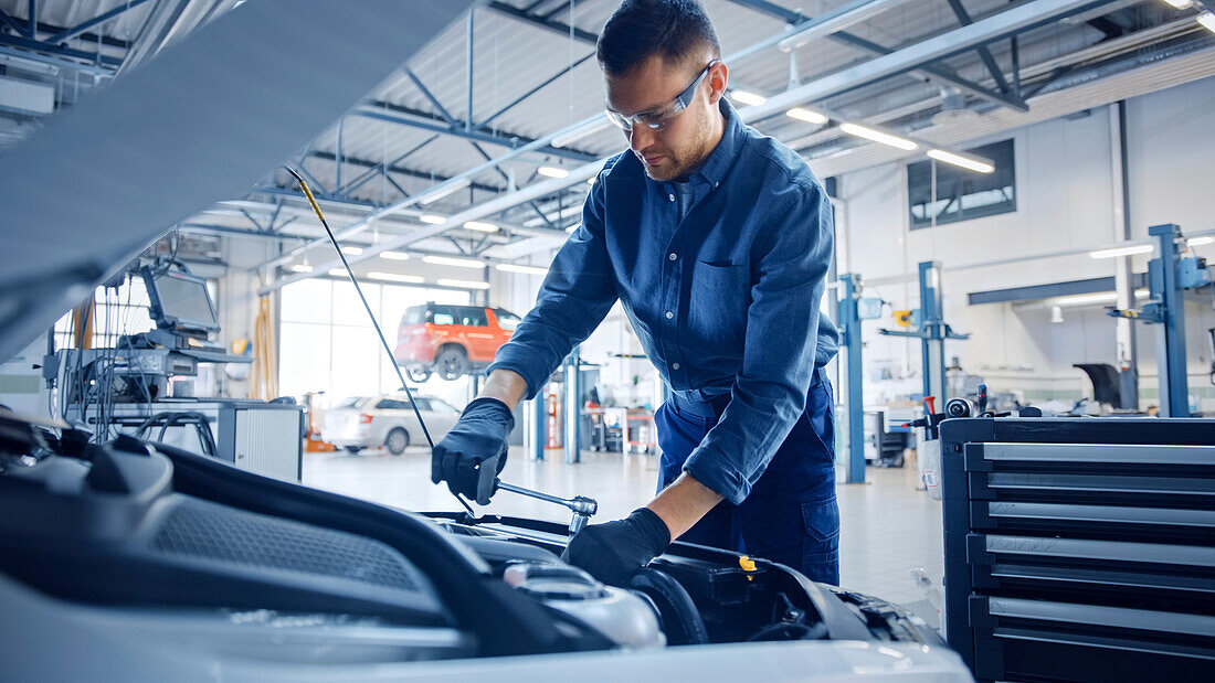 Mechanic working on car