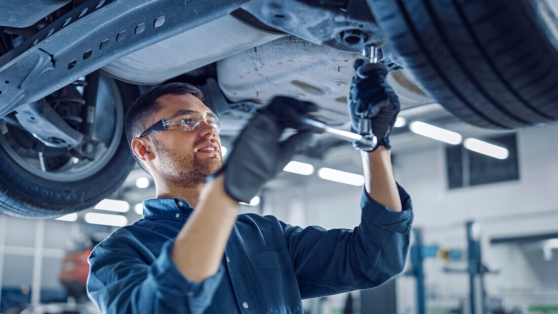 Mechanic working on car