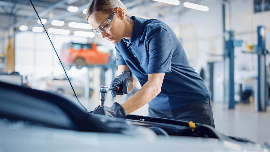 Mechanic working on car