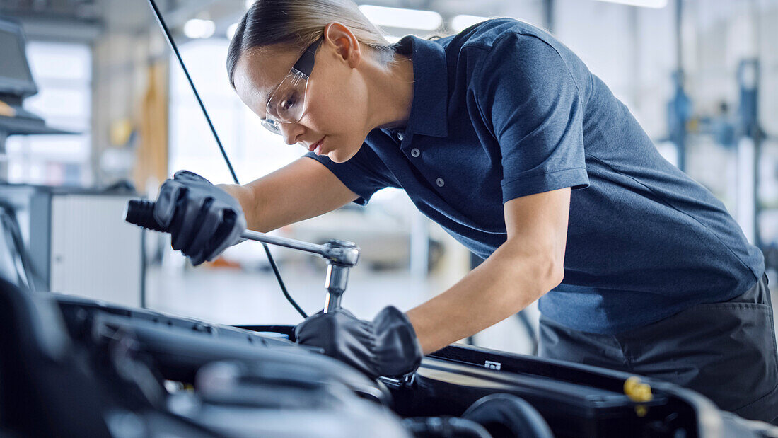 Mechanic working on car