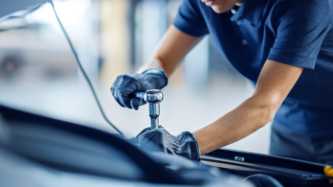 Mechanic working on car