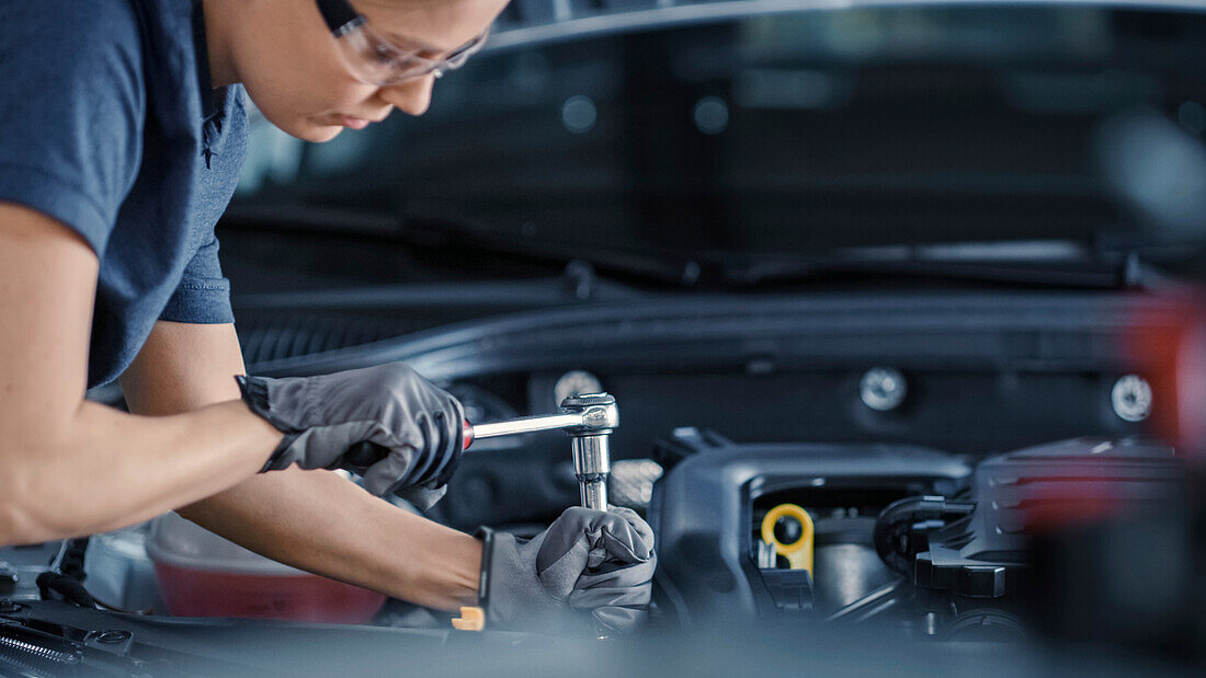 Mechanic working on car