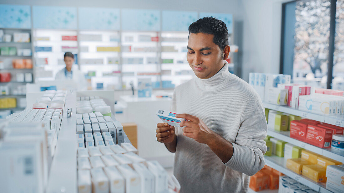 Customer browsing medicines in a pharmacy