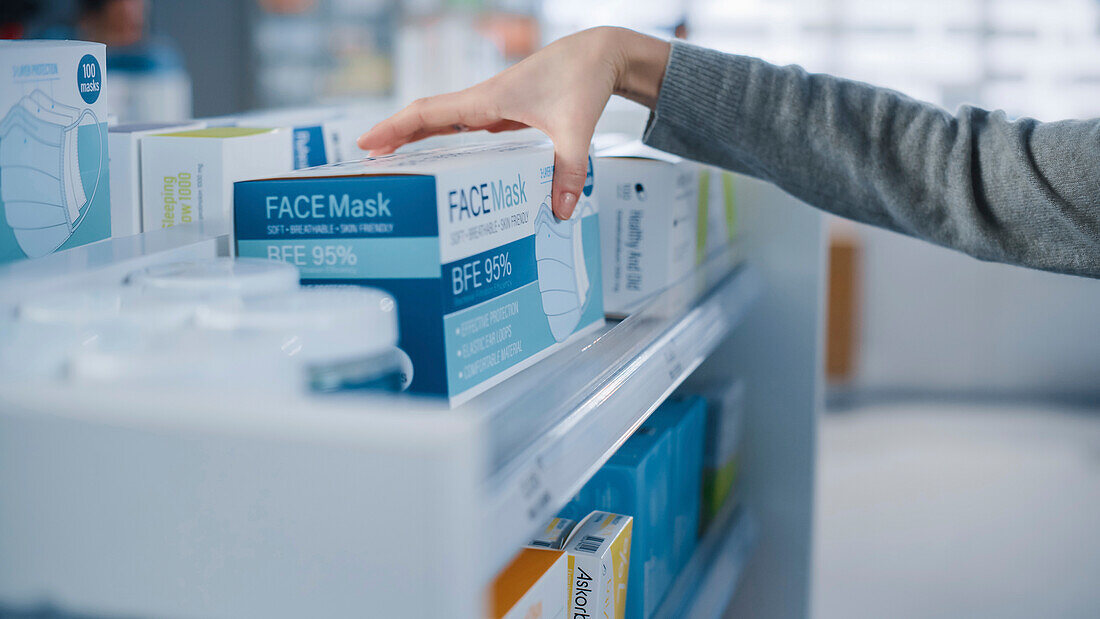 Customer looking to buy face masks in a pharmacy