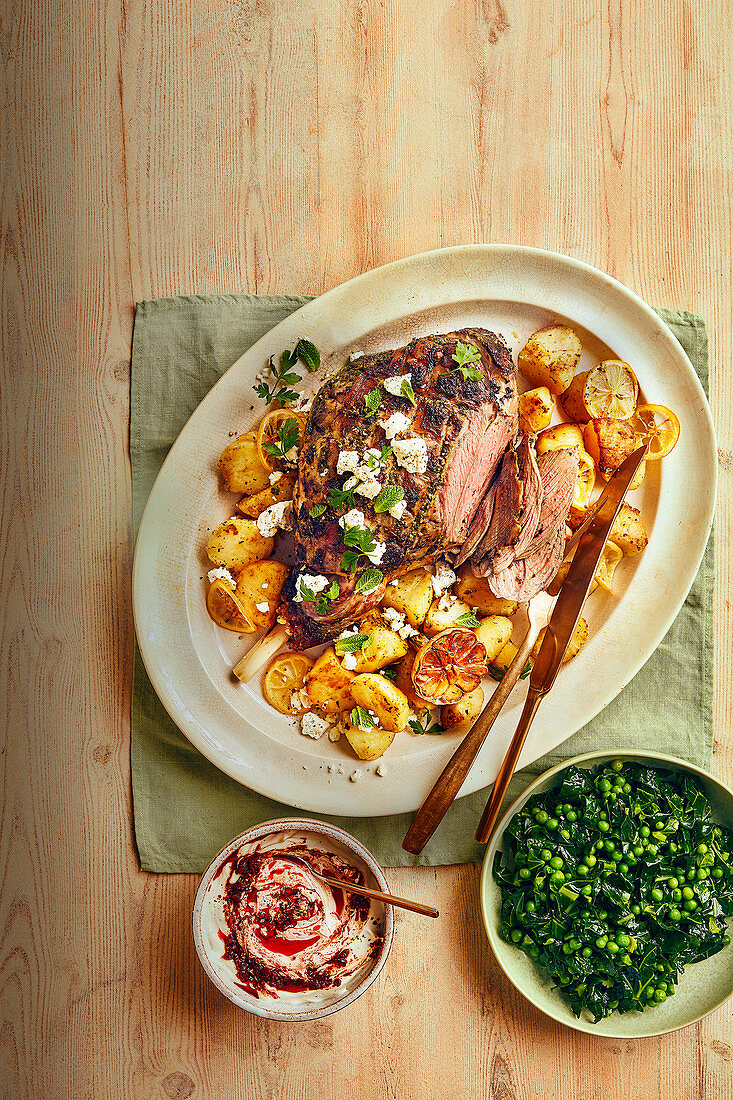 One-pan herby roast lamb with lemon, potatoes and feta