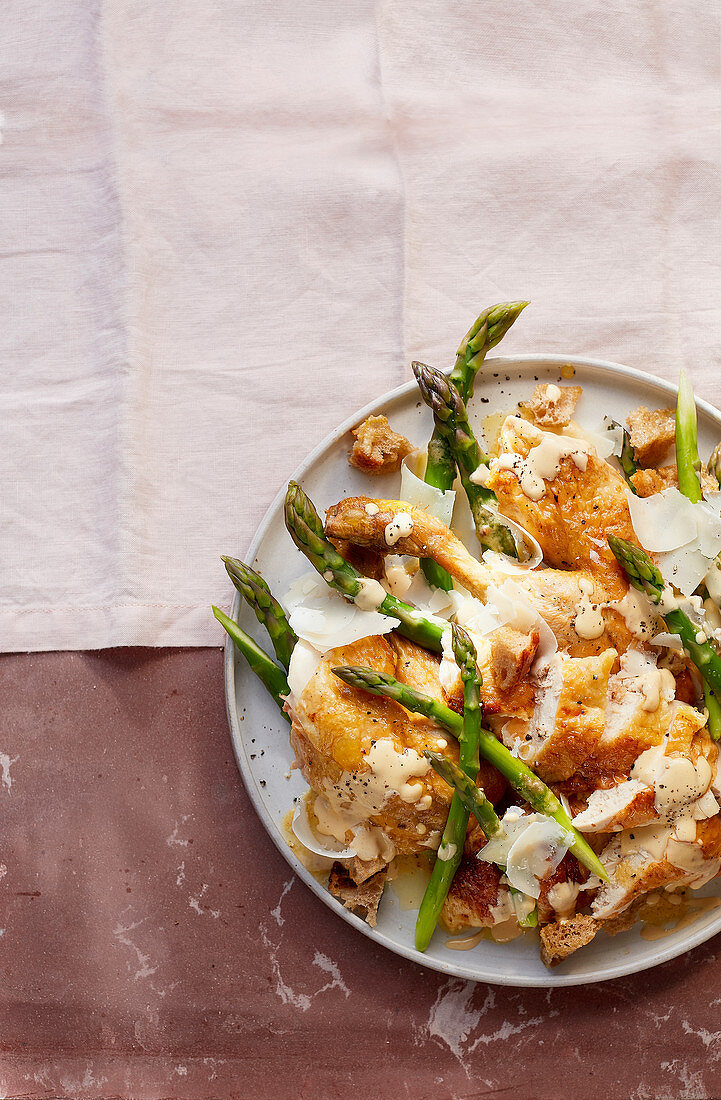 Whole crispy roast chicken and asparagus caesar