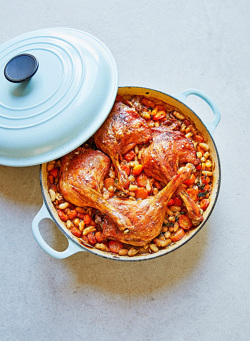 One-pan roast duck legs with white beans and carrots