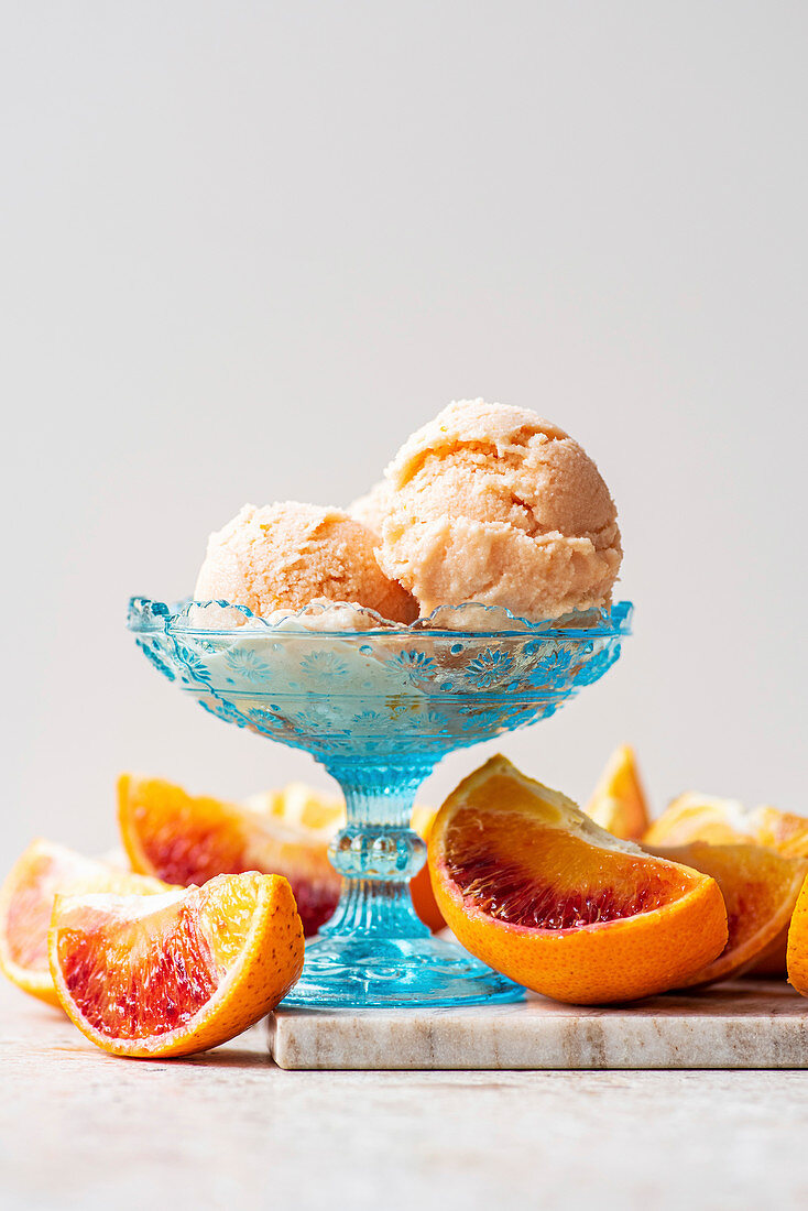 Homemade orange sherbet in dessert bowl