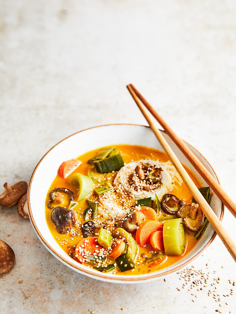 Asian soup with vegetables, shiitake mushrooms and sesame