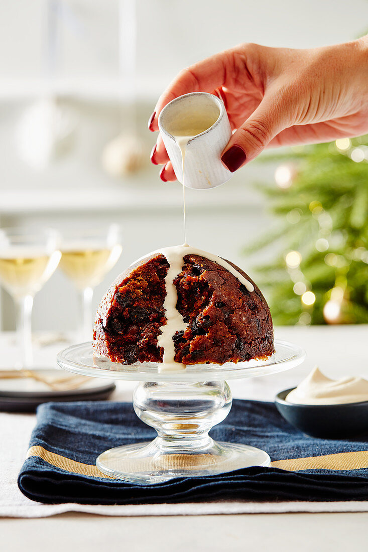 Christmas pudding with vanilla sauce