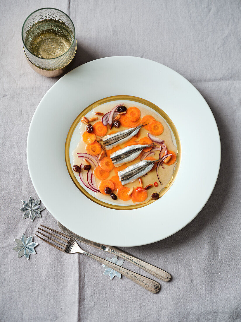Anchovy escabèche, with sweet and sour marinated carrots and cinnamon