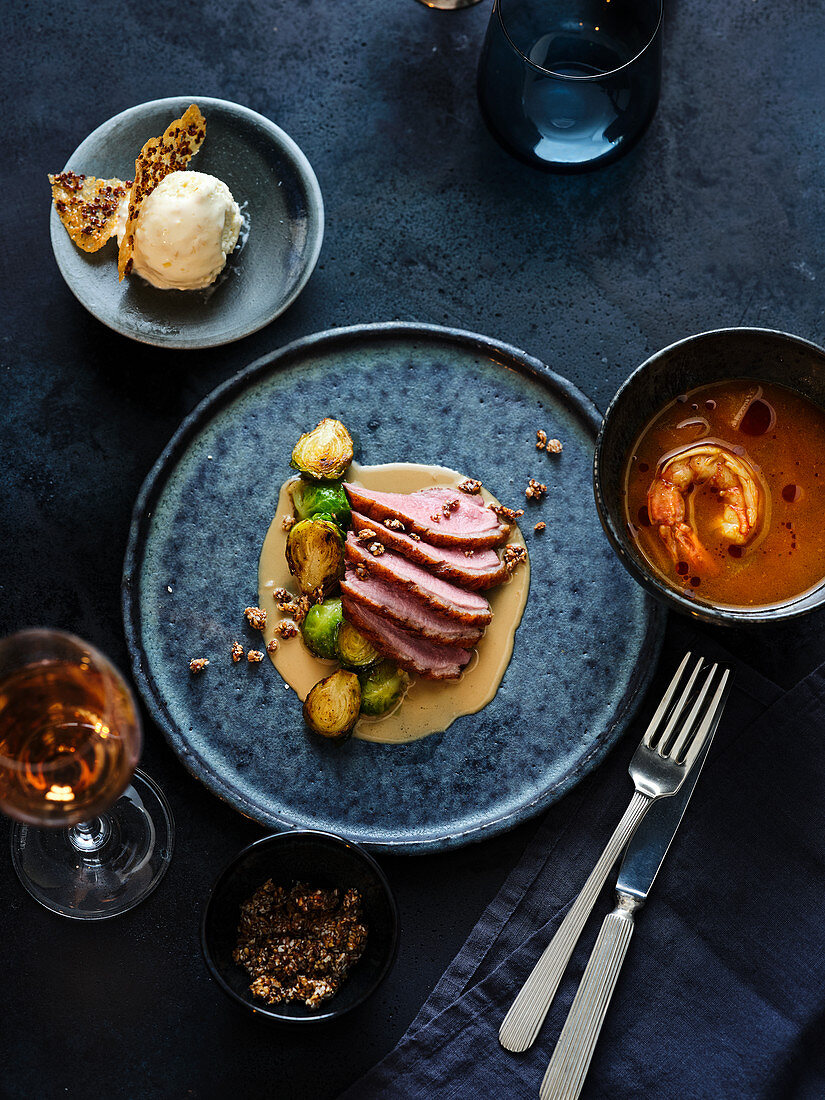 Christmas menu – duck breast with Brussels sprouts, pumpkin essence and ginger ice cream