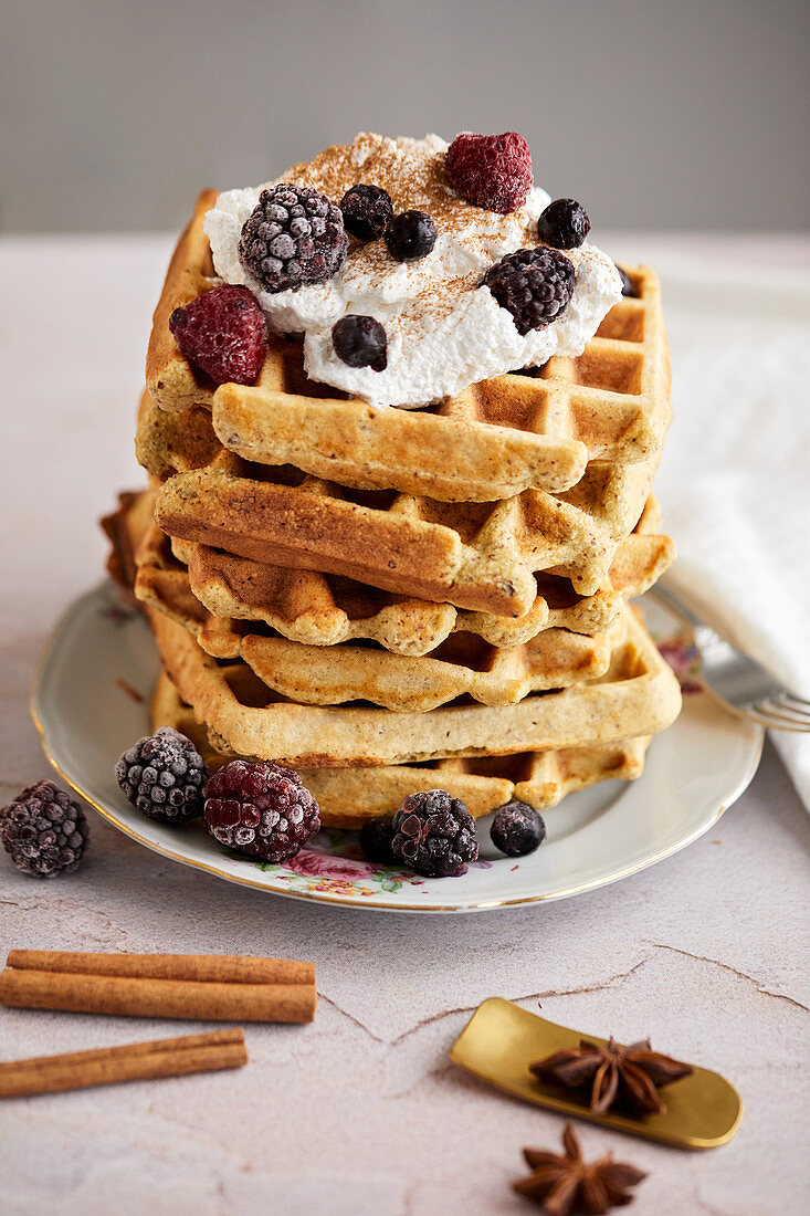 Waffles with sweet cream and fresh berries