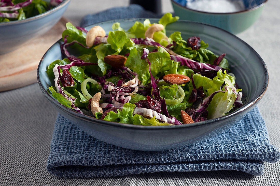 Mixed salad with dried fruits and cashew nuts