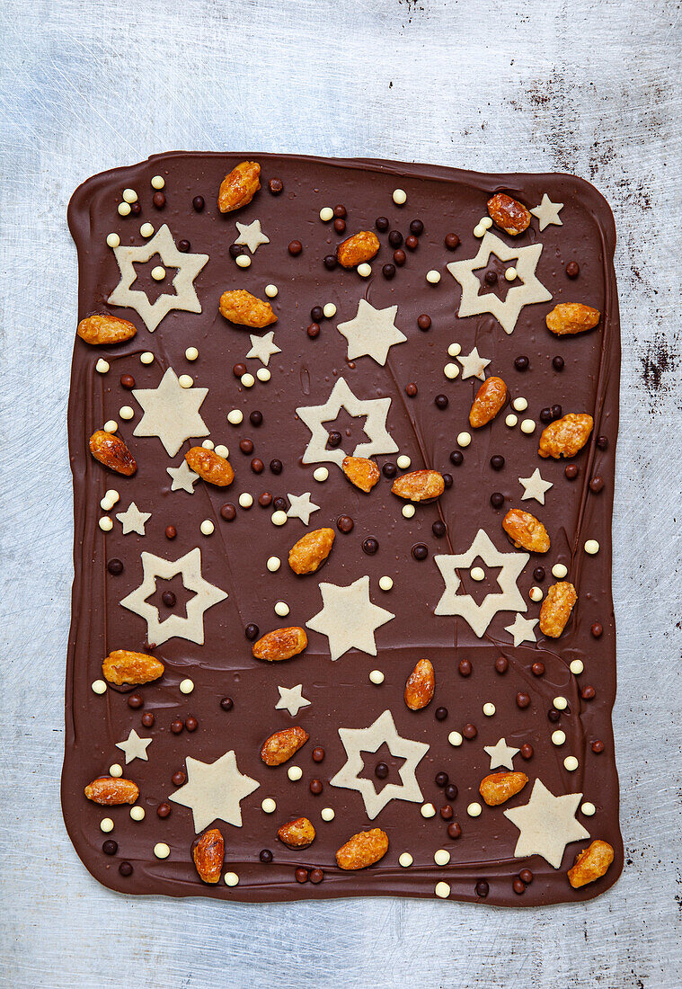 Dark chocolate block with marzipan stars and roasted almonds