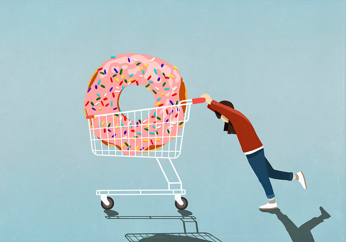 Girl pushing large sprinkle donut in shopping cart