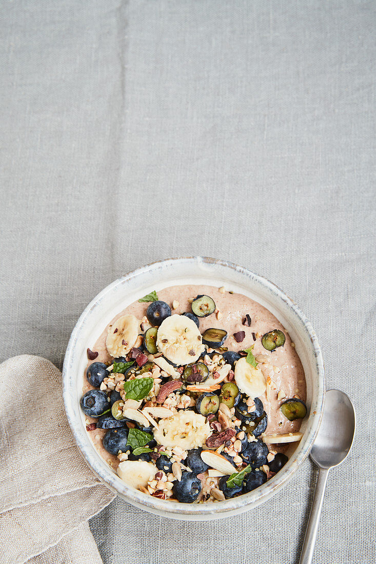 Vegan buckwheat hemp porridge with blueberries and bananas