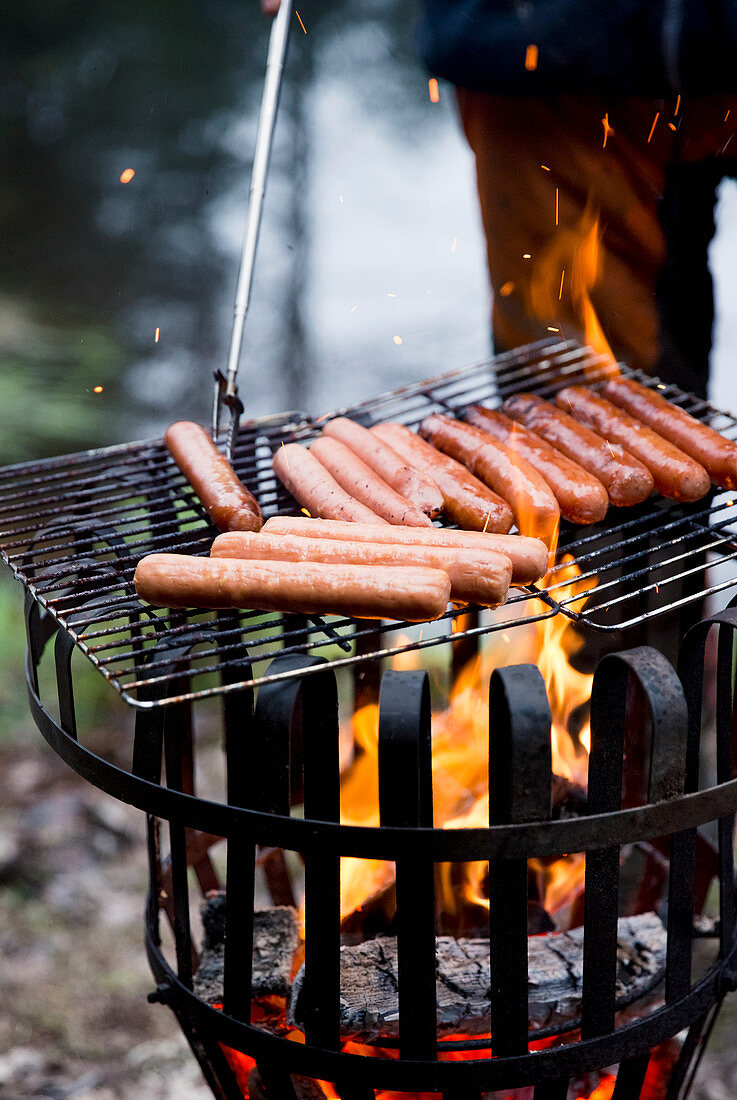 Grilling sausages, close-up