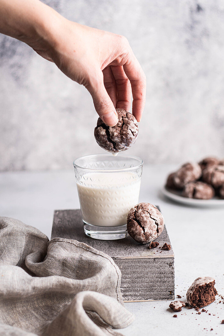 Dipping Gluten free Chocolate Crackle Cookies