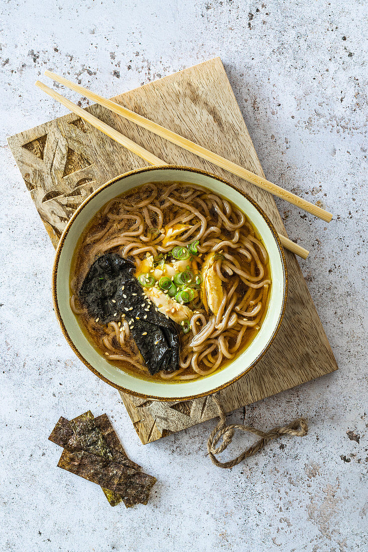 Ramen soup with soba noodles, chicken and seaweed (Japan)