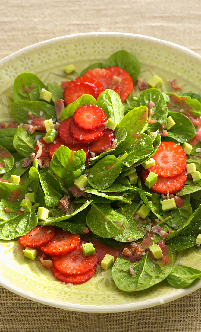 Spinach salad with strawberries and avocado