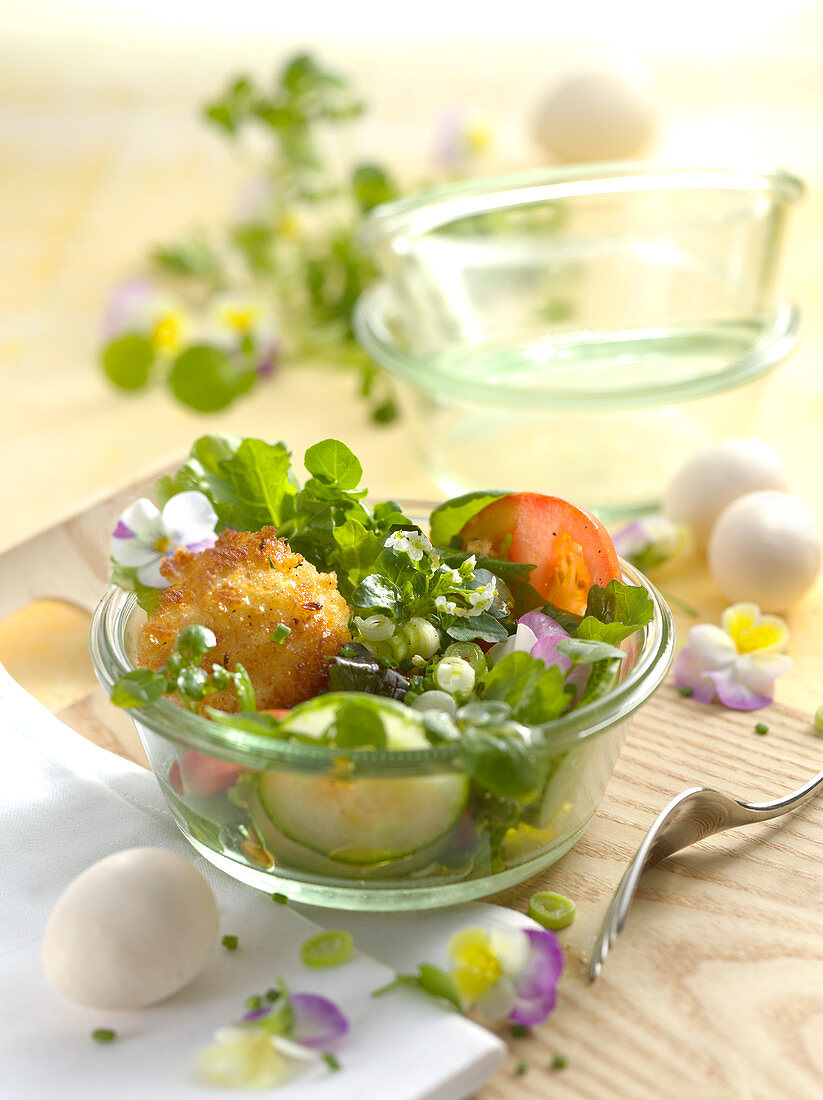 Wild herb salad with fried quail eggs
