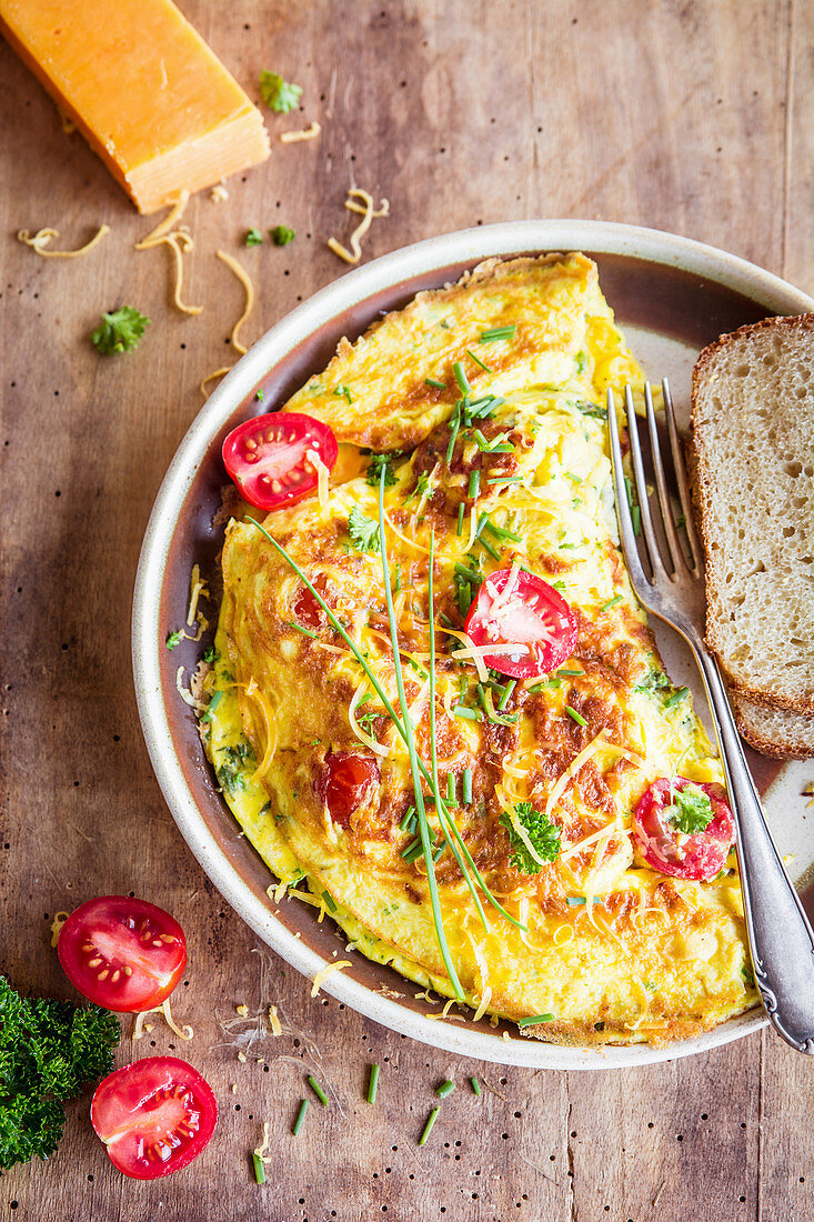 Cheddar and cherry tomato omelette