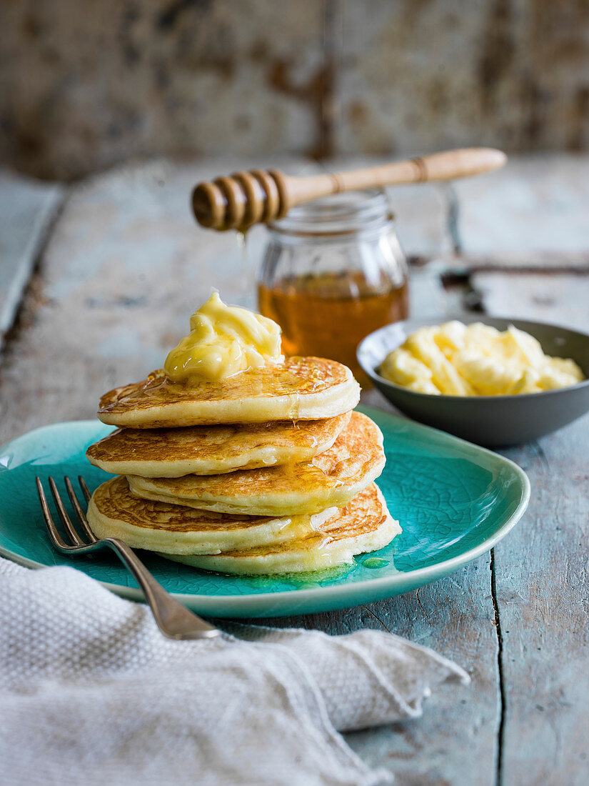 Fluffy ricotta pancakes with whipped honey butter